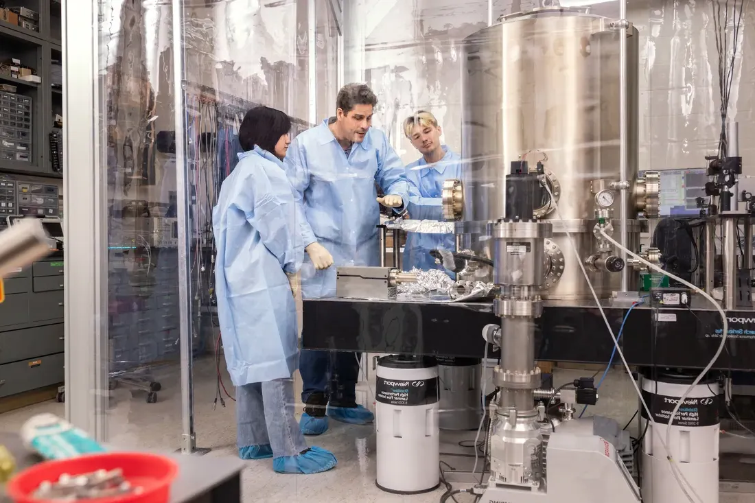 Graduate students in laboratory.